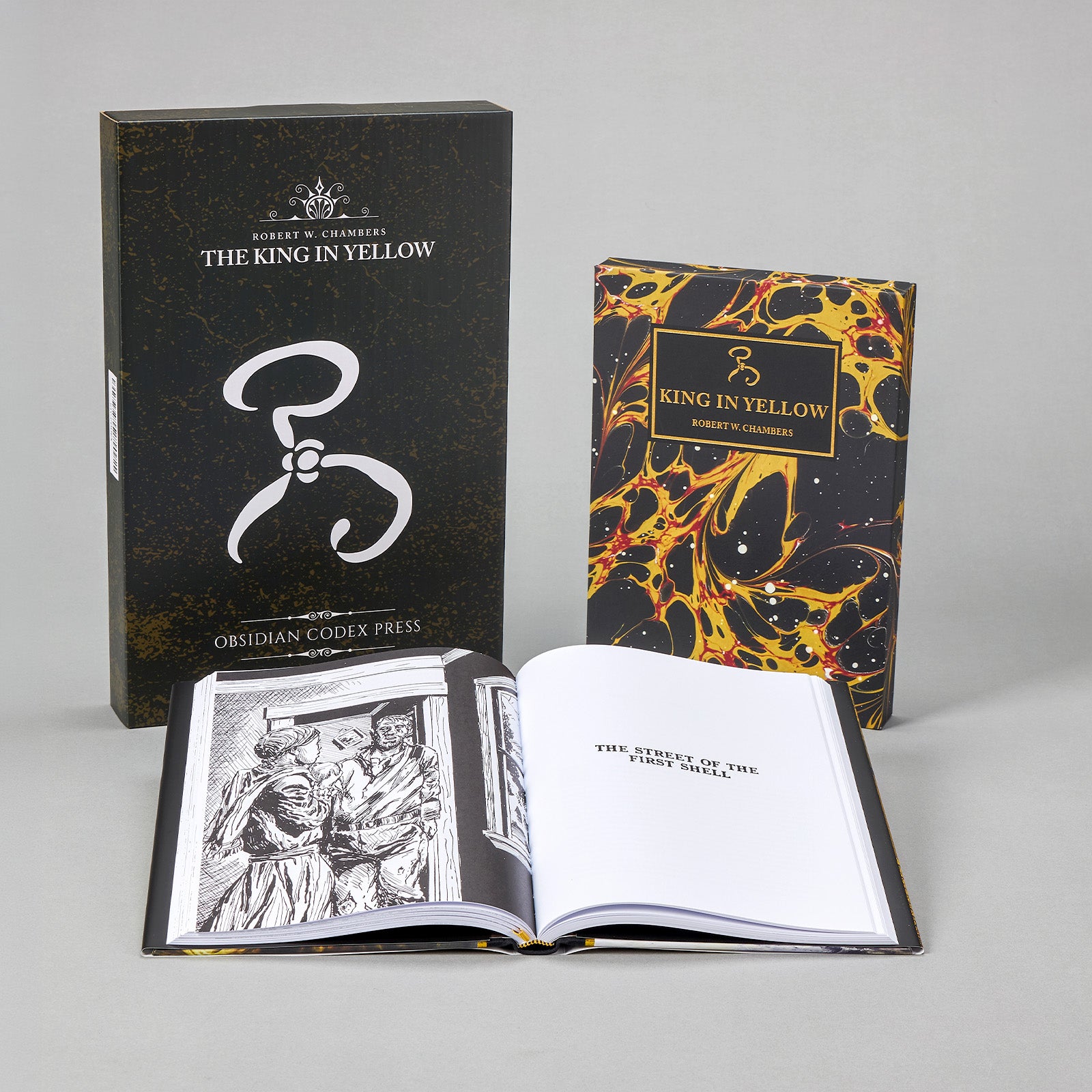 King in Yellow Codex Edition collector's set — book in dust-jacket, slipcase, and an open interior spread showing illustrations.