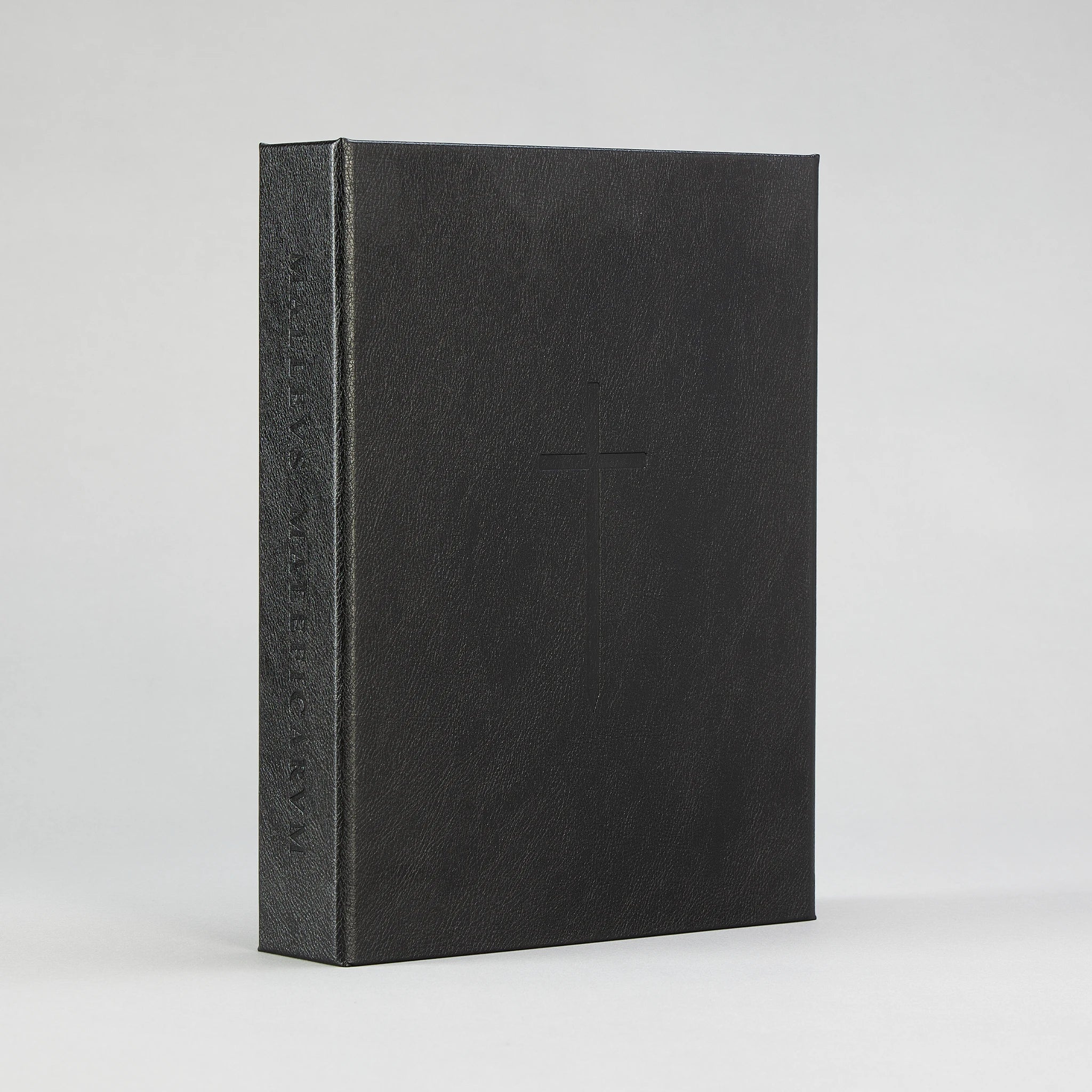 The Malleus Maleficarum, Artefact Edition — rounded spine with five raised bands, blind-debossed with papal keys