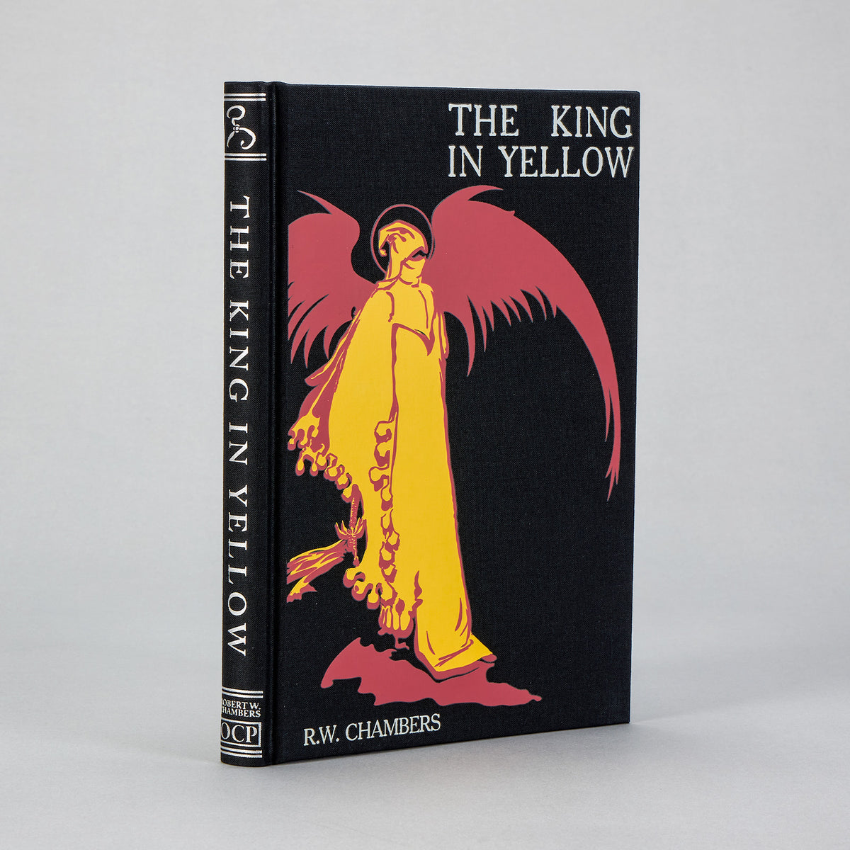 The King in Yellow Artefact Edition: black cloth binding with the red-and-gold King figure on the front board, after Chambers' 1895 third printing.