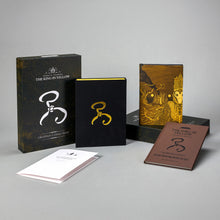 King in Yellow Artefact Edition collector's set displayed open — clamshell case, Carcosa pamphlet, hardcover with dust-jacket, and the play volume.