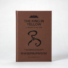 Companion volume — The King in Yellow: A Tragedy in Two Acts, a kraft-wrapped theatre booklet styled after late 19th-century printings.