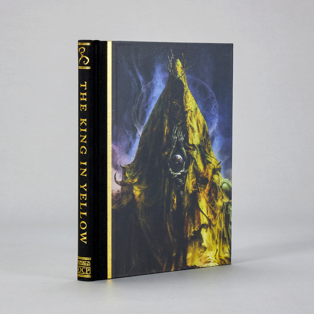 The King in Yellow Codex Edition: quarter-cloth hardcover with foil-stamped title, illustrated front board by Seung Gue Lee, and decorative spine.