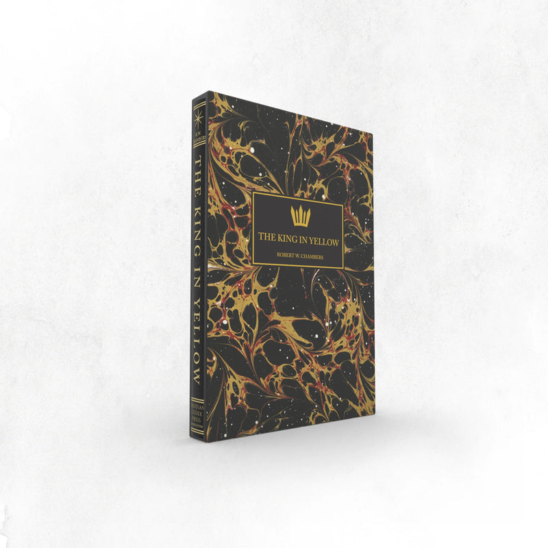 Book titled 'The King in Yellow' with black and gold design on a white background