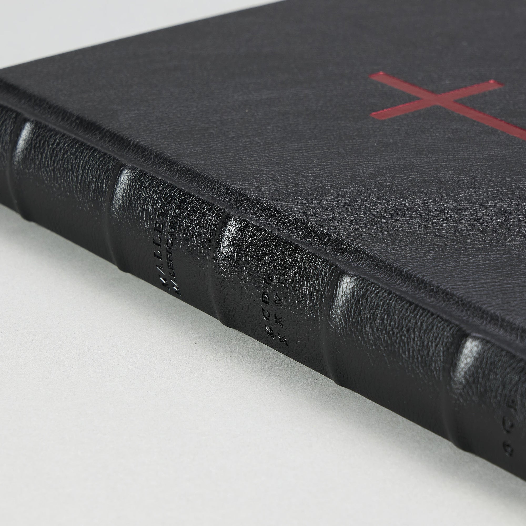 The Malleus Maleficarum, Artefact Edition — clamshell case with an ox-blood satin interior lining